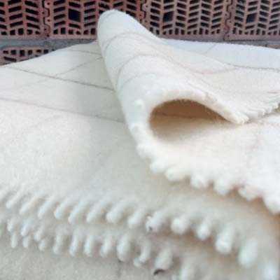 Manta Maragata de lana virgen para cama individual